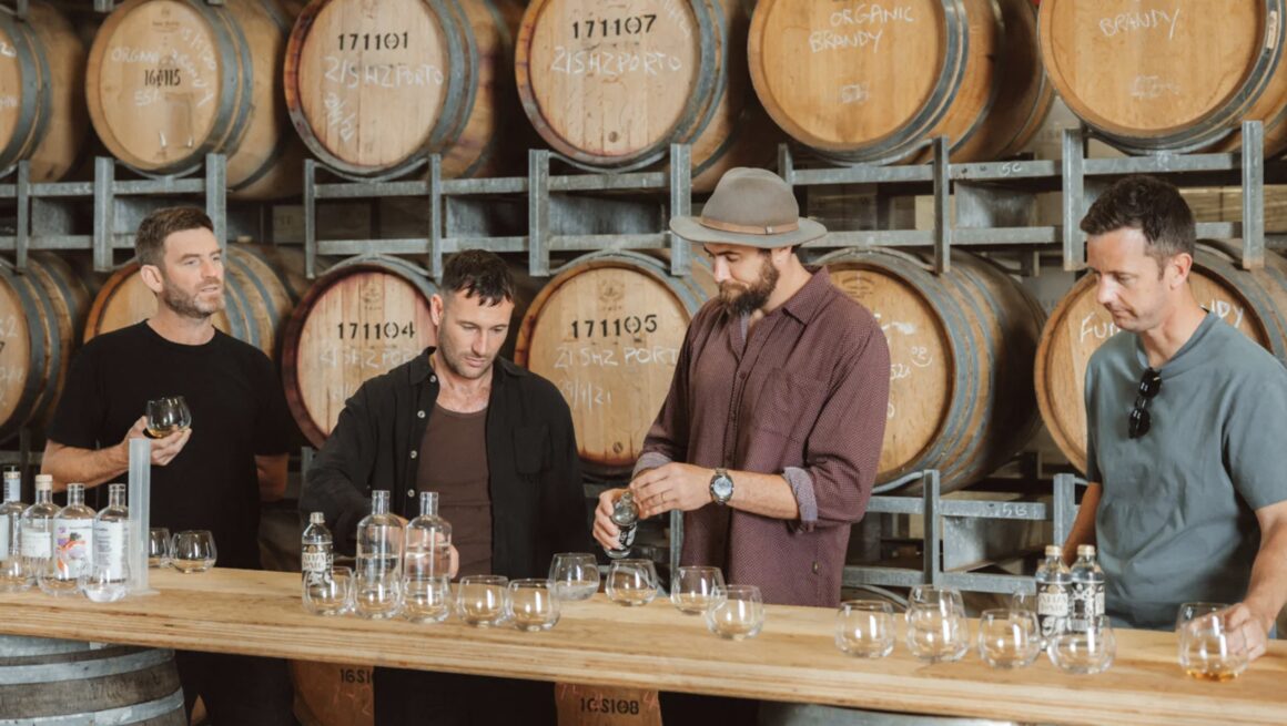 Four men enjoying a Spring on Queen masterclass at the Beyond Distilling pop-up